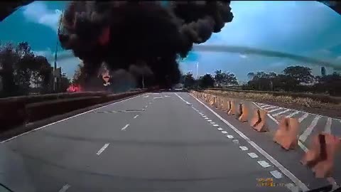 Captured on a car dashcam a private plane in Malaysia crashes