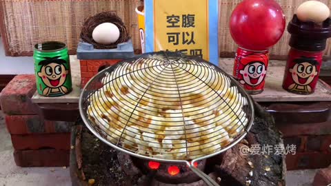 The whole process of making popcorn by heating the corn kernels at high temperature