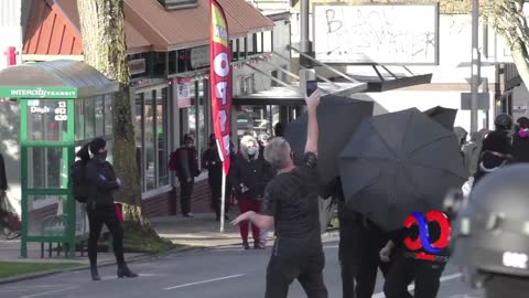 Umbrella Brigade Activates Vs One Solitary Filmer In Olympia Washington