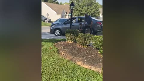 Hunter helping daddy fix mommy’s car