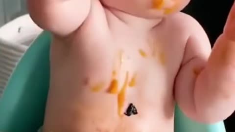 Funny baby eating