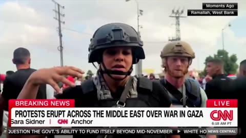 Palestinian protesters scream at CNN reporter in West Bank, security escorts her away