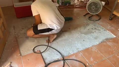 Home renovation timelapse: Tile repair preparation.