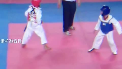 Riveting Duel: Two Kids Spectacular Taekwondo Match!