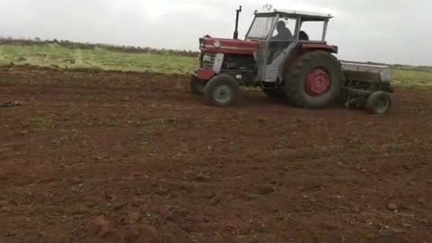 Land while plowing with Tractor