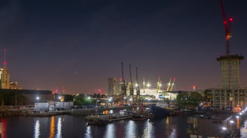 Shot of a pier in the city City ​​lights and pier at night