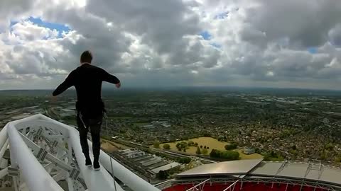 Daredevil climbs to top of Wembley arch