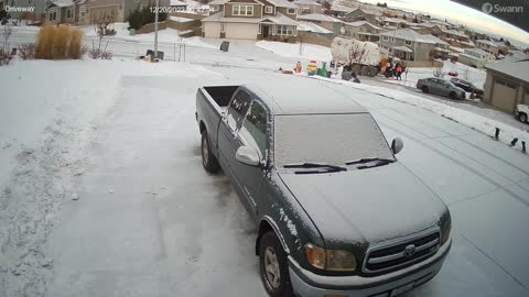 Garbage Truck Slides Down Snowy Hill