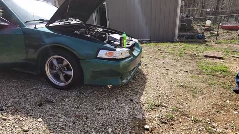 Cam Working on His Mustang