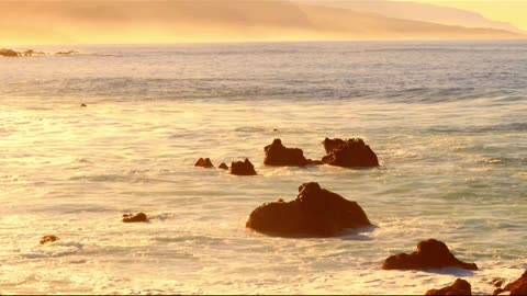 Sunset and the Sea Waves