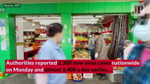 Nearly 30 million people under lockdown across China as virus cases surge