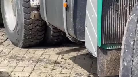 How did the road that was run over by tires become like this when the big truck passed by?