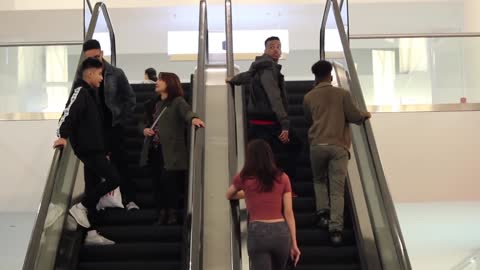 Prank-Touching Stranger's Hand on Escalator