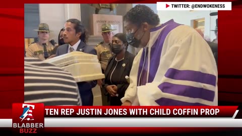 Ten Rep Justin Jones With Child Coffin Prop