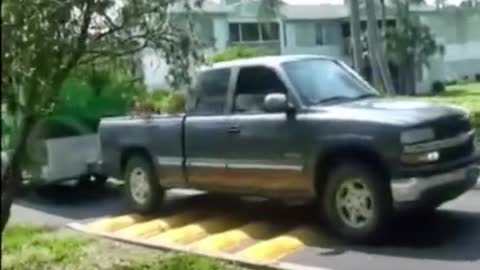 Truck passes speed bump