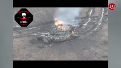 The drone destroys the abondon Russian T-62 tank and armored fighting vehicles