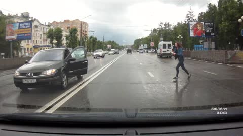 Woman Stops Her Car In The Street To Rescue A Kitten From Traffic