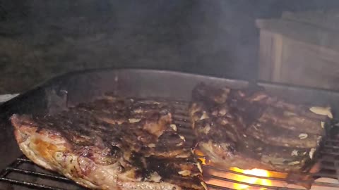 Pork Ribs Sizzling On The Grill