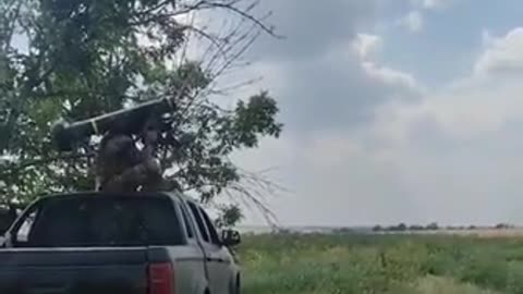 Ukrainian serviceman fires Javelin missile targeting a Russian tank