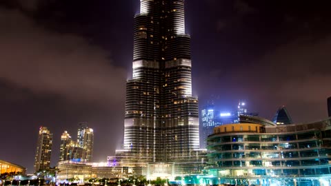 Burj Khalifa skyscraper at night and fountain