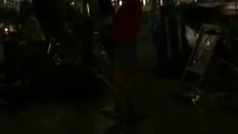 Random street dancer in front of bar fails to impress