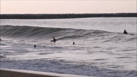 Big waves slam surfers in Southern California