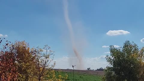 Dust Devil Dances Across Freshly Raked Paddock