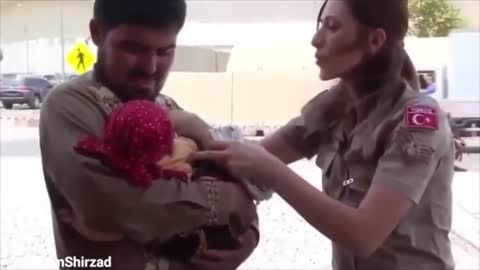 Afghan Crisis: Turkish Military Takes Care of Baby Separated from Mother at Kabul Airport