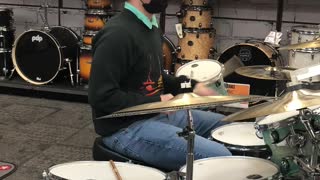 Playing drums