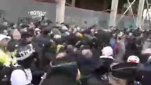 PROTESTERS IN PARIS PUSH BACK THE POLICE