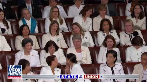 AOC stands to applaud after Trump touts female employment #s