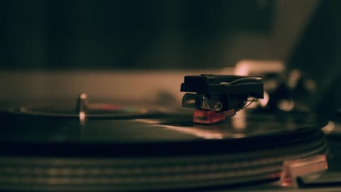 Playing A Vinyl Record On A Spinning Turntable