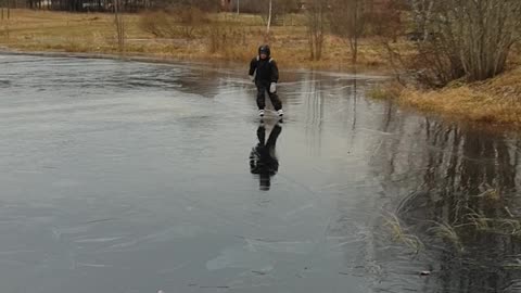 Man Ice Skating Finds Slim Spot in the Ice