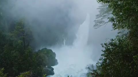 A waterfall with blue water running down