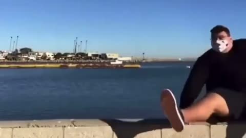 Big man falling down in river, while doing dance, funny video