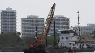 U.S. Coast Guard in Halifax River Erecting Poles