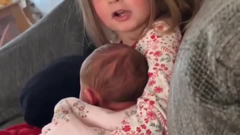 Cute baby and little girls funny talk