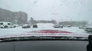 Car window filling up with snow