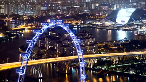 Ferris wheel and the Singapore city scape