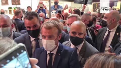 French President Macron is Pegged In The Face with a EGG By A Man Shouting 'Vive la Revolution'