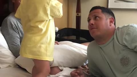 Surprised Toddler Throws Phone into Dad's Face