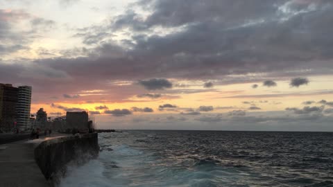 Golden sunset of malecon bay