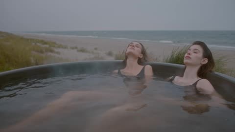 Two Women Bathing Together