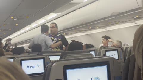 Passenger Argues With a Flight Attendant