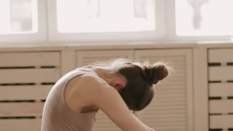 Woman doing a Yoga pose perfectly at her home