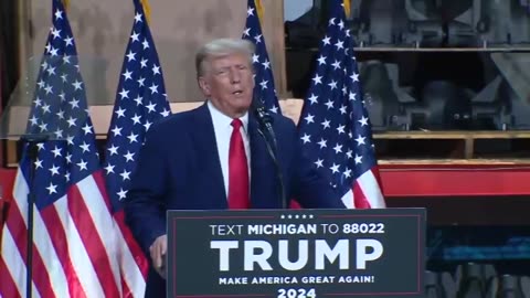 Former President Donald Trump speaks before striking UAW members in Macomb County