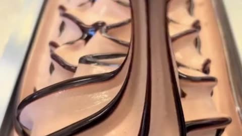 Watch: Machine Perfectly Filling Chocolate Ice Cream—No Humans Needed! 🍫🍦