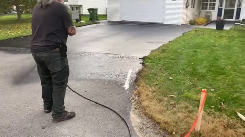 Professional Asphalt Spray Sealing: “The Wet Patch One” Top Coats Pavement Maintenance