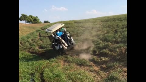 Guy flips over golf cart trying to show off