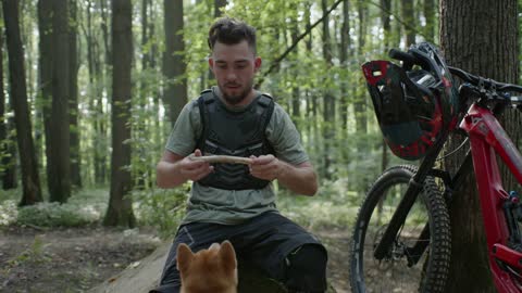 A man training his dog, so much cute dog learns quickly